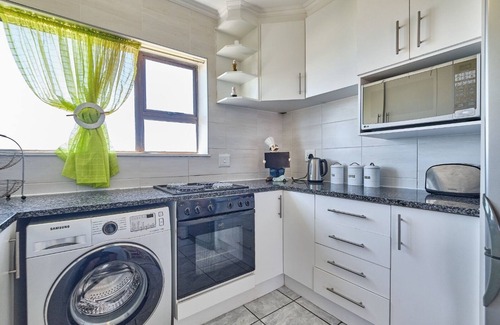 Amanzimtoti Apartment | 504 Amazibu Holiday , a minute's walk to a beautiful beach