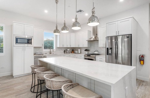 West Bay Condo | 7 Mile Luxury Beach Club. Ocean views from Roof Terrace and Pool Pavilion.