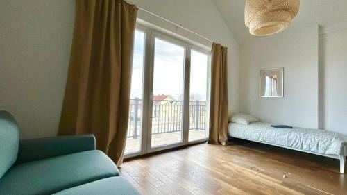 Fohrenhain Apartment | 75 m2 Rooftop Apartment with Balcony
