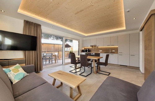 Bichlbach Apartment | 80m² modern vacation apartment with balcony, free bathing lake, 100m to the ski area