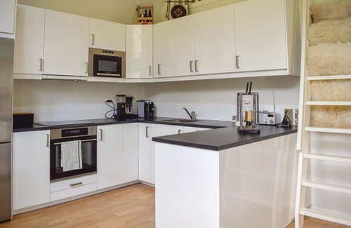 Farsund House | A beautiful holiday home in a quiet location in Åptapark, not far from the Åptafjord.