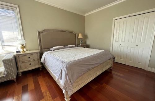 Richmond House | A cozy bedroom with a private washroom close to YVR Richmond