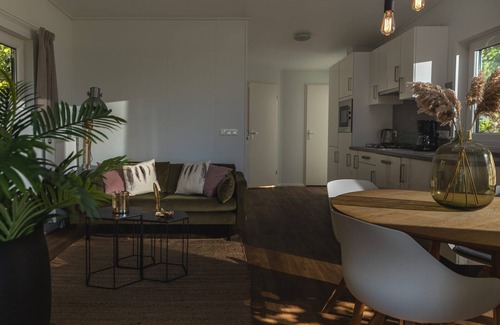 Zuna Cabin | A lodge with hot tub and views over the Regge River. A sales pitch is really not necessary.