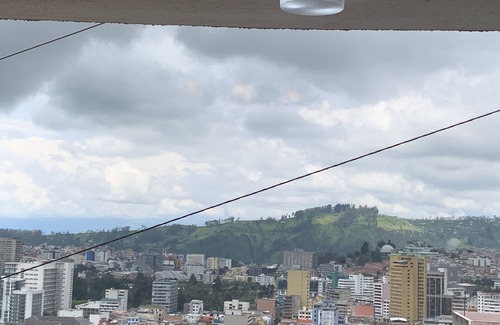Quito House | A modernized home in the midst of a stable, family oriented neighborhood.