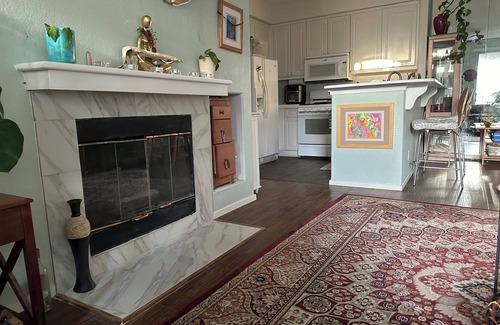 Sabre Springs Condo | A room wt a queen bed and room with 2 twin beds; an attached,interior bathroom.