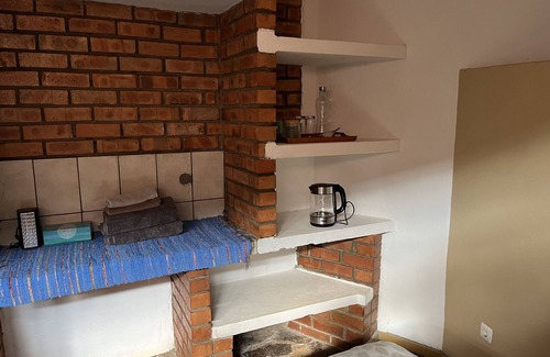 Naamacha Cottage | A small twin room in Namaacha