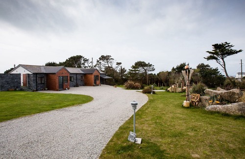Sennen Cottage | A spacious Holiday Cottage with garden, moments walk from Lands End.