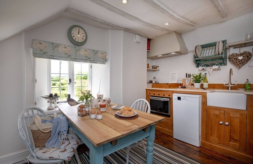 Honiton Cottage | A stunning, one bedroomed, beamed thatched cottage in the village of Stockland.