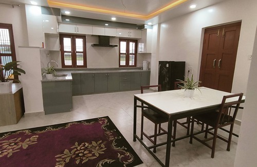Bharatpur House | A two-bedroom home with a living room, kitchen, and garden feels like home.n