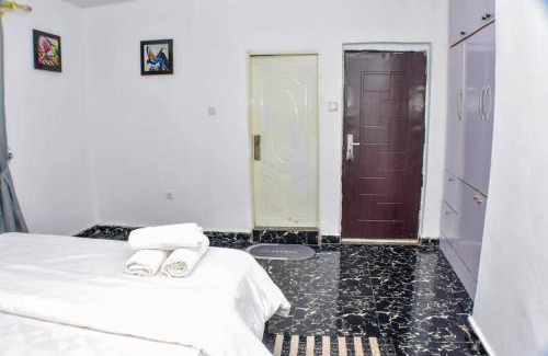 Okpanam House | AC Apartments