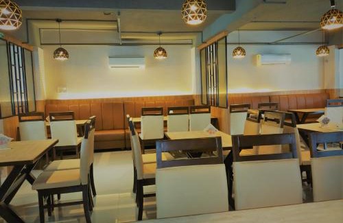 Adyar Hotel | Adyar Plaza Inn by RAK Rooms, Mangaluru