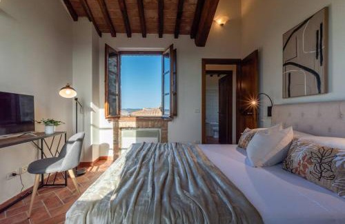 Asciano Apartment | AffittiBreviSiena - Palazzo Monaci Appartamento con piscina nelle crete Senesi
