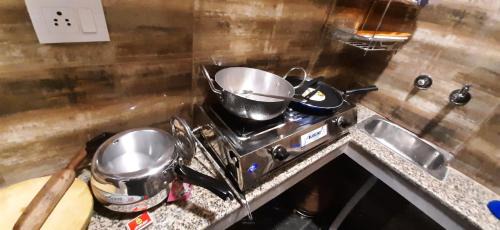 Lajpat Nagar Apartment | Aggarwal independent studio apartments with private washroom and private kitchen with all utensils, fridge, wifi with smart tv, work desk, fully ac as like your own sweet home