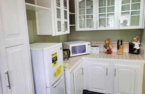Westmoorings House | Air-conditioned 4 bedroom townhouse great location, Westmall area