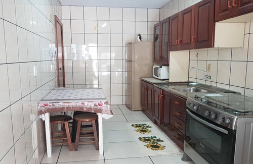 Castelo Branco Apartment | Air conditioning in 3 bedrooms, barbecue, 1 parking space, 1 block from the sea.
