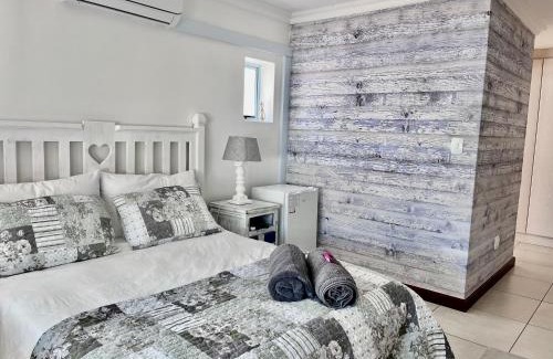 Calypso Beach House | Aircon 63 on Coral