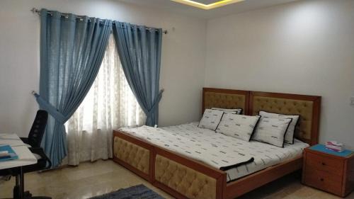 Fatehjang Apartment | Airport Layover Family Lodge