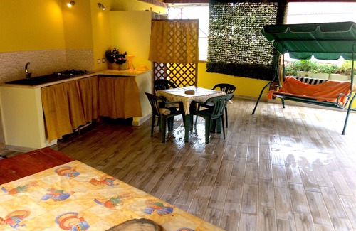 La Taulera Apartment | Alghero, Spiagge Bianca Maria Pia, beautiful veranda with outdoor kitchen