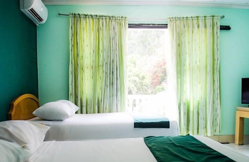 Port of Spain Hotel | Alicia's Palace