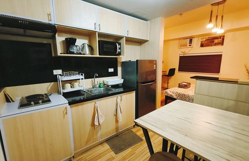 Binan City Condo | All-in-One Studio Getaway: Comfort, Style, and Fresh Surroundings