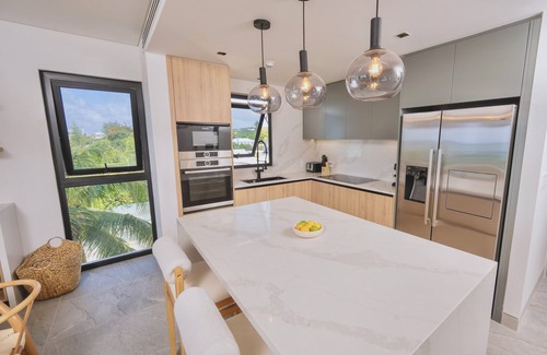 Brighton Condo | Allure 305: 3BDR Oceanfront Condo with Stunning Rooftop Pool & Beach Chairs