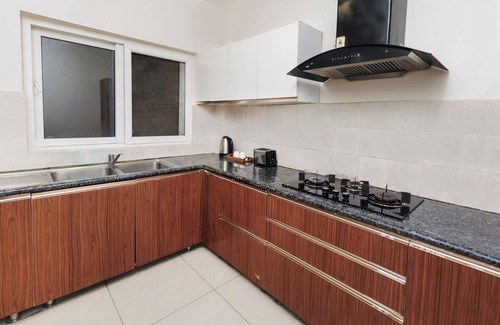 Rishikesh Apartment | Amalia House | Family-sized condo with cozy modern interiors