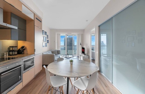 Wellington Place Hotel | Amazing 1BR Suite - Rooftop Pool - View