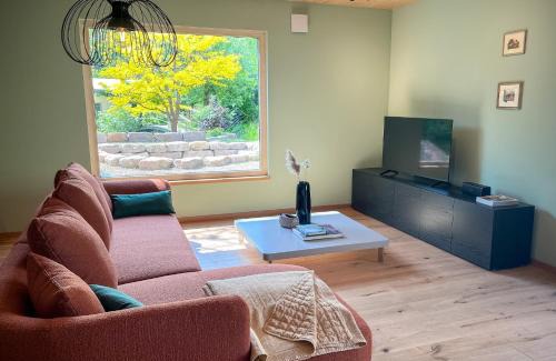 Hofheim in Unterfranken House | Amber Ferienhain - Ferienhaus 'Magnolie' mit verwunschenem Garten & privater Sauna
