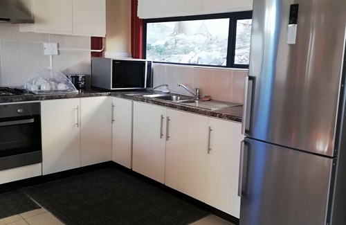 Maseru Apartment | An enticing getaway with a homely ambience, resembling the comfort of your home.