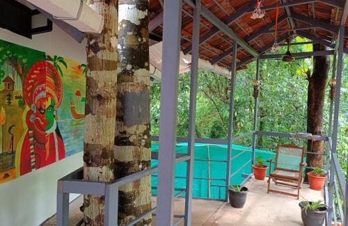 Vaikom Hotel | Anandam Woods - A Heritage single Room for couple-small family
