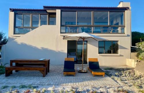 Paradise Beach Apartment | Anura - Luxurious Stay, 100m leap to the Beach!