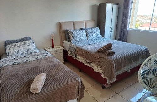 Santo Angelo Apartment | Apart próximo a Unimed e Catedral de 2 quartos com AR, mini-Academia e garagem no Centro-sul