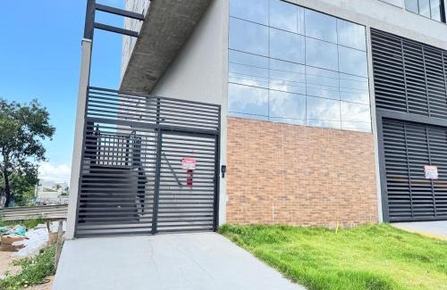 Plano Diretor Sul Apartment | Apartamento novo - garagem inclusa