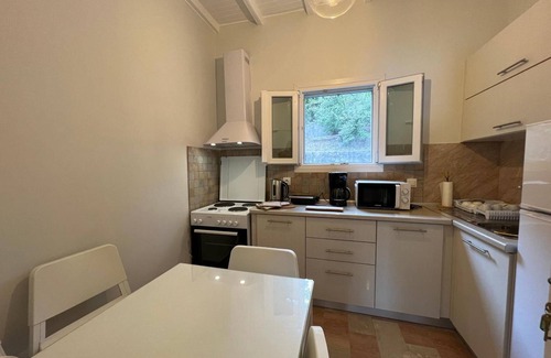 Benitses Apartment | Apartment 'Amaranth Rose' with Private Garden, Wi-Fi and Air Conditioning