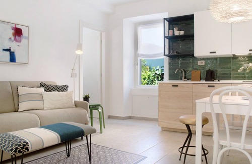 Lavena Ponte Tresa Apartment | Apartment 'Atelier Milvia 1' with Private Terrace, Private Garden and Wi-Fi
