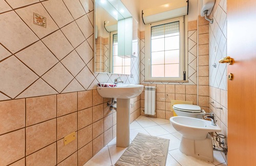 Sestu Apartment | Apartment 'Casa Rosa' with Private Garden and Air Conditioning