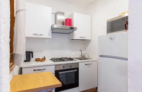 Cugnana Verde Apartment | Apartment 'Casa Vacanze Cugnana Verde' with Sea View, Wi-Fi and Air Conditioning