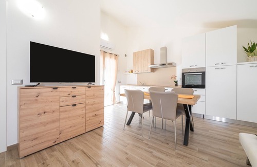 Sant'Antioco Apartment | Apartment 'Casa Vacanze Alba Mar' with Balcony, Wi-Fi and Air Conditioning