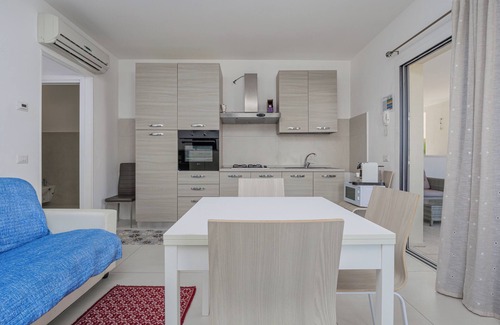 Golfo Aranci Apartment | Apartment "Cormorani - 7" Near the Beach with Wi-Fi, A/C, Terrace & Garden