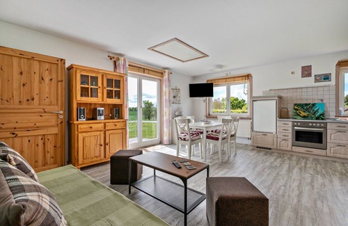 Saustrup Apartment | Apartment 'Ferienwohnung Joerrick' with Private Terrace, Private Garden and Wi-Fi