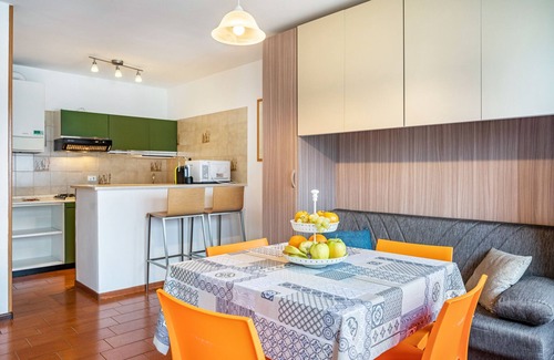 Calceranica al Lago Apartment | Apartment 'Garden Alle Barche - Marina 7' with Lake View, Shared Garden and Wi-Fi