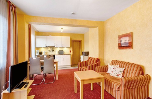 Stryck Apartment | Apartment 'Haus Erika - Ferienwohnung 1' with Shared Garden, Balcony and Wi-Fi