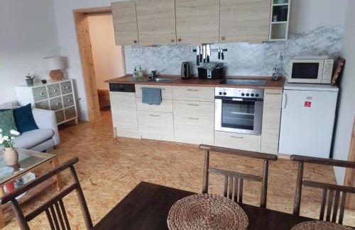 Nove Mesto pod Smrkem Apartment | Apartment in blossom garden