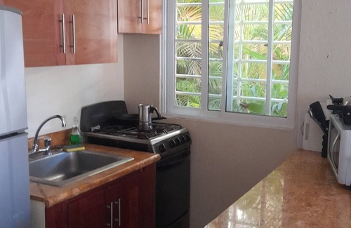 Costambar Apartment | Apartment in a beautiful tropical garden, 2 minutes walk to the beach.
