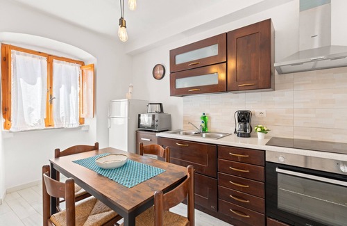 Bosa Historic Centre Apartment | Apartment in the Historic Center "Casa Rocca" with Castle View from the Terrace