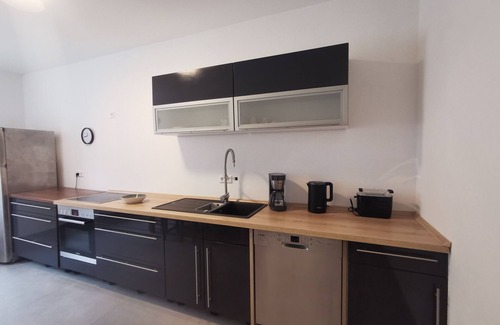 Braunsbach Apartment | Apartment 'Komfortneubauwohnung Braunsbach' with Mountain View, Shared Terrace and Wi-Fi