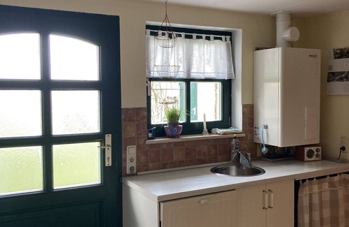 Kroepelin Apartment | Apartment 'Krueselwind' with Private Terrace, Shared Garden and Wi-Fi