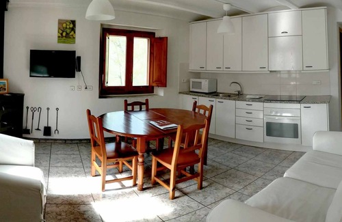 Santa Pau Apartment | Apartment 'Mas El Carrer - Groc' with Mountain View, Shared Pool and Wi-Fi