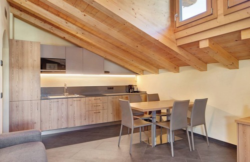 Livigno Apartment | Apartment 'Rasia Residence Relax' with Mountain View, Shared Garden and Wi-Fi