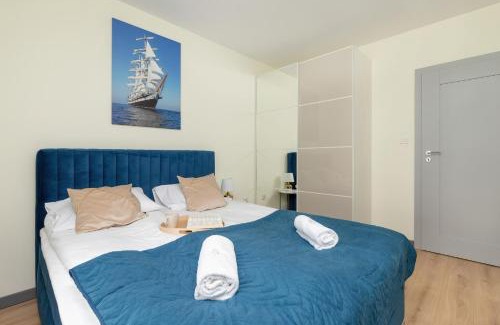Nowy Port Apartment | Apartment Starowiejska with Balcony & Parking next to Gdańsk Arena Stadium by Noclegi Renters